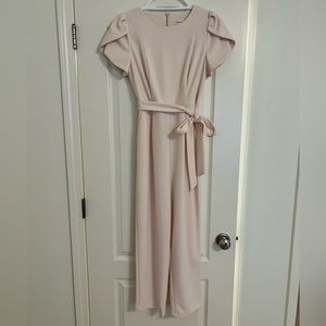 Pale pink long jumpsuit. Slim fit